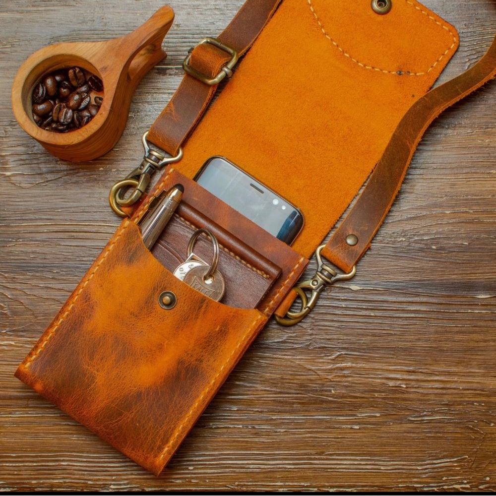 Grain leather bag for cell phone and wallet.